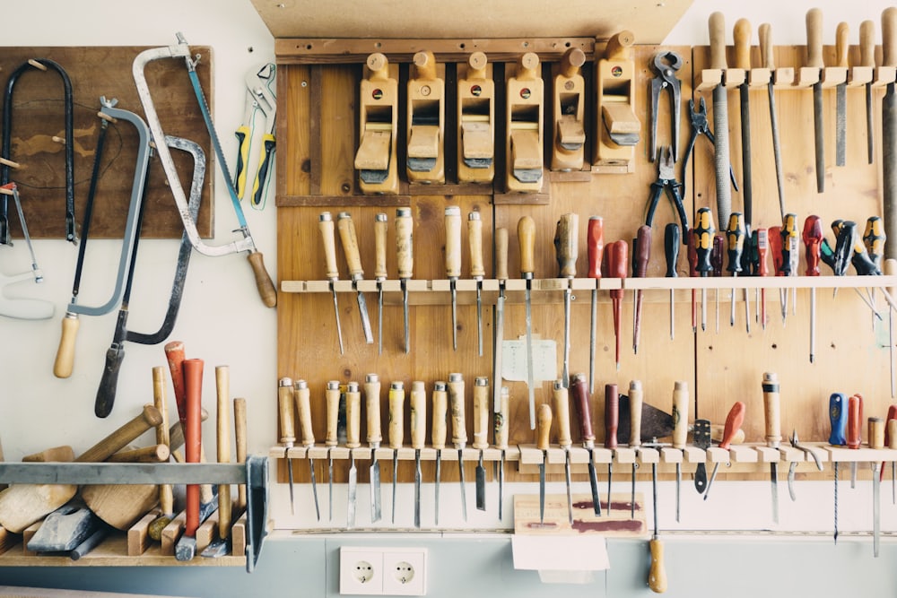 Workshop wall of hand planes and chisels